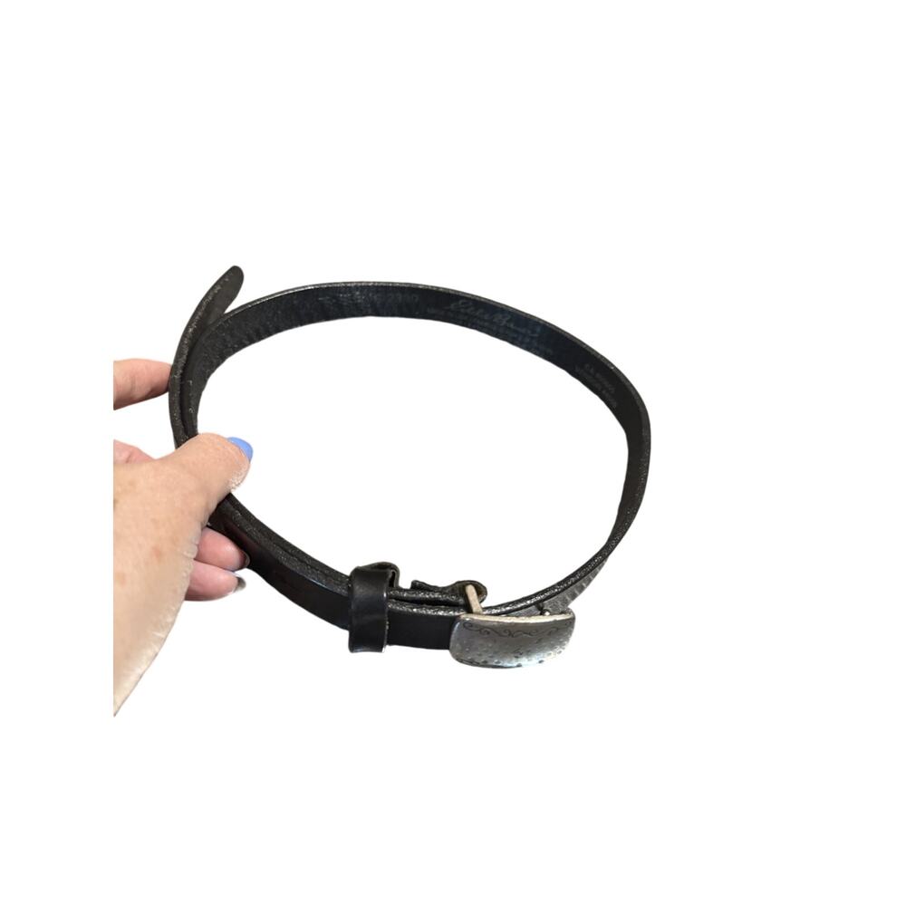 Eddie Bauer black leather belt with an engraved silver-toned buckle. Small
